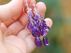 "THE JEWELRY IS SHIPPED via DHL EXPRESS (2-5 days delivery door to door). THE DHL SHIPPING COST IS INCLUDED IN THE PRICE. The Violet Dance Earrings - Purple Amethyst Earrings Cascade, Long Cluster Gemstone Earrings ► Measurements / Details: - Length including earwire: 2.5\" (~6.4 cm) *can be made shorter/longer per request - Silver: High quality Sterling Silver - Gold: High quality Gold Filled ► Gemstones: The earrings include excellent AAA quality gemstones, they are undyed, natural, superbly f Purple Briolette Fine Jewelry Earrings, Purple Briolette Earrings For Wedding, Purple Gemstone Chandelier Drop Earrings, Purple Gemstone Long Drop Earrings, Purple Gemstone Chandelier Earrings, Purple Gemstone Accented Dangle Earrings, Purple Gemstone Dangle Earrings, Amethyst Chandelier Earrings For Pierced Ears As A Gift, Amethyst Chandelier Earrings As Gift