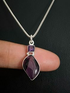 "GENUINE AMETHYST PENDANT Natural Amethyst Necklace, February Birthstone Jewelry NECKLACE FEATURES: Metal: All components are made from solid .925 Sterling Silver Model is wearing 16\" in length solid .925 Sterling Silver Chain Length available: 16\", 18\" or 20\" Measurement: Sterling Silver Natural Amethyst Pendant Height: 28 mm Width: 18 mm Please send me a message if you have any questions before or after placing your order. Please also view my policy before purchasing. Please visit my store Purple Gemstone Necklace For Wedding, Purple Teardrop Necklace For Wedding, Amethyst Necklaces For Wedding, Silver Amethyst Necklace For Wedding, Valentines Day Jewelry, February Birthstone Jewelry, Silver Model, Natural Gemstone Necklace, Rainbow Moonstone Pendant