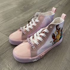 Ground Up Girls' Disney Princess Ariel, Snow White, Moana, Tiana, Belle, And Jasmine High Top Sneakers, Pink, Size 3 Fit For Your Little Disney Princess Fans, These Sneakers Let Them Explore The Kingdom With Ariel, Snow White, Moana, Tiana, Belle, And Jasmine At Their Side. Metallic Pu Upper Offers A Comfortable Feel. Beaded Lace Keeper Adds Details. Flat Cotton Laces Ensure The Right Fit. Canvas Midsole Provides Comfort. Vulcanized Tpr Outsole Delivers Traction, Durability, And Protection. Pink Disney Princess, Red Suede Shoes, Tie Dye Shoes, Champion Sneakers, Toddler Converse, How To Dye Shoes, Baby Dior, Black Slip On Sneakers, Disney Princess Ariel