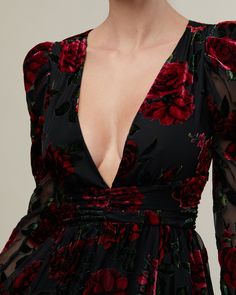 Made from floral burnout velvet, this dress is ruched to hug the figure, and has puffed sleeves that frame the plunging neckline, as well as a high side slit. Figure hugging Puff sleeves Plunging neckline High side slit 80% Rayon 20% Nylon Hand wash with cool water. Do not bleach. Do not tumble dry. Hang dry. Do not iron. Winter Dress With Sleeves, December Wedding Guest Dress Long Sleeve, Whimsigoth Bridesmaid Dress, Dark Floral Outfit, Black Dress With Red Heels, Edgy Wedding Guest Outfit, Dark Yellow Dress, Black Dress With Roses, Velvet Dress Outfit