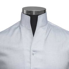 "Men's High Open V Collar Grey 100% Cotton Long Sleeves Dress Shirt MADE-TO-ORDER CLOTHES Shirt Style: Karl Lagerfeld Style/ High Chinese Mandarin Collar/ High Open V Collar Collar Style: 3\" High Stiff Buttonless Collar Pockets: Without pocket (Chest pocket can be added on request) Fabric: 100% Giza cotton soft & comfortable fabric Sleeves: Full Sleeves/ Long Sleeves Fine stitched (20-21 stitches per inch) Cleanly finished buttonholes Flat Felled Seams Hand cut and sewed individually High-quality tailoring Savile Row / British style collar Cuff: 4\" wide single cuff, with 3 buttons These shirts are made with a single cuff. For the double cuff, please leave us a message. * The shirts are made on order in our family-run workshop. Thus we take this long to ship. Every piece is individually h Male Closet, Mens High Collar Shirts, Karl Lagerfeld Style, Karl Lagerfeld Fashion, High Collar Shirts, Open Collar Shirt, Chinese Mandarin, Long Sleeve Cotton Dress, Grey Shirt Dress