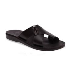 “Asher classic leather sandal handcrafted in Jerusalem. Featuring cross with toe loop design to provide comfort, style and support for years to come. split Vegetable-tanned natural leather Leather sole molds to your feet Comfortable polyurethane outsole Durable textured grip sole Light and flexible Hand-Crafted in East Jerusalem Modern Leather Slip-on Footbed Sandals, Adjustable Black Slip-on Sandals, Black Slip-on Flip Flops With Leather Sole, Black Leather Sole Slip-on Sandals, Black Leather Sole Slides Slip-on, Top Straps, Mens Slide Sandals, Ankle Strap Sandals Flat, Toe Loop Sandals