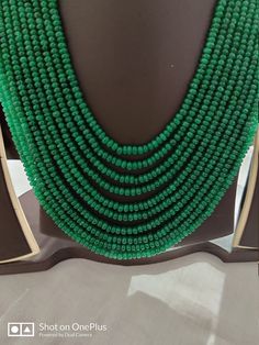 Awesome AAA 22''Emerald Beryl 757 Carat Fine Quality Emerald Beryl Rondelle Smooth 3- 4 MM Beads Gemstone Nacklace Stone :Emerald Beryl Shape :- fancy rondelle Necklace - 22 inch 10 line string Size :- 3mm to 4mm Weight :- 757 carat Polish :- Handmade Quality - AAA color - green The necklace is with tassel because you can easily adjust your necklace length. If you want any changes in the necklace example if you want with clasp we can do it. makes a great gift for your loved ones. It is known as Green Beaded Bridal Necklace With Round Beads, Green Gemstone Beads For Wedding, Green Emerald Necklace With Faceted Beads, Green Emerald Round Bead Jewelry, Green Emerald Round Beads Jewelry, Green Gemstone Beads Jewelry For Formal Occasions, Green Gemstone Beaded Necklaces For Wedding, Elegant Green Rondelle Beads, Emerald Necklace With Polished Round Beads For Wedding