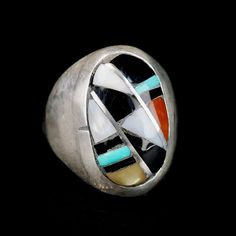 Wonderful Vintage Zuni Ring by Ralph and Lillie Kallestewa, they have been active jewelers since the 1950s.This ring is a  Multi Stone Sterling Silver Inlay, with Turquoise, Jet, Mother of Pearl and Coral.  This ring will look great on both men and women. Size 10 1/2 Measures 1 " tall Weight 18.9 grams Collectible Multi-stone Turquoise Oval Ring, Vintage Collectible Opal Gemstone Ring, Vintage Opal Ring Collectible, Artisan Rings With Inlay For Anniversary, Antique White Multi-stone Rings, Art Deco Multi-stone Collectible Jewelry, Oval Multi-stone Gemstones For Collectors, Modernist Multi-stone Ring, Southwestern Multi-stone Jewelry For Anniversary