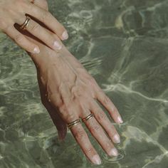 Organically shaped and hand polished. This ring is one of our best sellers and is perfect for stacking or wearing alone. DETAILS & SIZE - Available in bronze, sterling silver, or gold - Measurement | 4mm at the thickest and 2mm at the thinnest