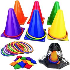 several different colored plastic cones and other toys