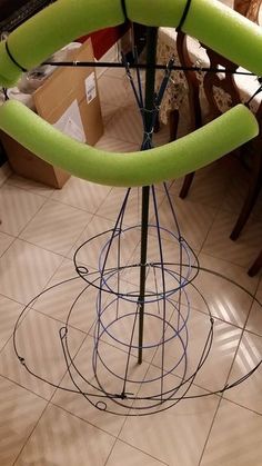 an upside down umbrella stand on the floor