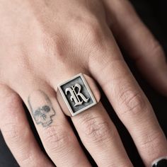 A handmade sterling silver 925 initial rectangle shape signet ring with a frame and 3D letter and an oxidized background. Each ring is cleaned and polished with care. The weight of the ring may vary according to size. Top measurements: Width - 14.5mm | Height - 17mm Approx weight: 9.94gr This awesome ring is available in more shapes! Click here to see: Round: https://www.etsy.com/il-en/listing/568044811/letter-initial-signet-ring-silver-letter Octagon: https://www.etsy.com/il-en/listing/56804684 Silver Open Ring With Monogram Engraving, Silver Monogram Engraved Open Ring, Silver Open Ring With Initials, Minimalist Silver Monogram Ring, Minimalist Monogram Silver Ring, Classic Silver Initial Ring With Monogram, Silver Rectangular Initial Ring Classic Style, Silver Rectangular Initial Ring In Classic Style, Classic Silver Rectangular Initial Ring