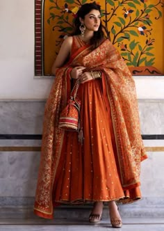 Bridal Kurti Designs, Suit Designs Indian Style Wedding, Bridal Trousseau Outfits, Orange Indian Wedding Dress, Pooja Outfit Indian, Orange Anarkali Suits, Orange Indian Outfit, Haldi Outfit For Bride, Kurti Anarkali