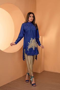 SKU: 221 Price for Shirt & Trouser 2pc Pure Karandi silk fabric with crochet. The applique is of silk embroidery with crystals. Pakistani Suits Design, Silk Embellished Long Sleeve Sets, Designer Silk Sets With Intricate Embroidery, Embroidered Satin Sets For Eid, Eid Embroidered Satin Sets, Designer Silk Sets With Lace Work, Fitted Silk Sets With Lace Work, Embroidered Silk Tops For Eid, Eid Embroidered Silk Top