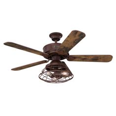 an old fashioned ceiling fan with two wooden blades and a caged light fixture on it