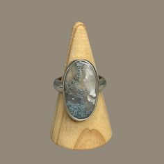 Title: Handcrafted Moss Agate  Statement Ring - .925 Sterling Silver, .999 Fine Silver , Size 10  || Gemstone || - Moss Agate  || Metal || - .925 Sterling Silver and .999 Fine Silver  || Ring Size  10 || Packaged, ready for gift giving || Description: Make a bold statement with our exquisite handcrafted ring featuring Moss Agate a symbol of elegance and sophistication. This stunning piece, meticulously created in Royal Oak, Michigan, boasts a fusion of .925 Sterling Silver and .999 Fine Silver, ensuring enduring beauty and quality craftsmanship. This statement ring, designed in size 10, combines the iridescent allure of Moss Agate with the luxurious touch of Sterling Silver, promising a standout addition to your jewelry collection. Stackable and versatile, it effortlessly transitions from Gem Stone Ring, Royal Oak Michigan, Statement Ring Silver, Handcrafted Rings, Royal Oak, Size 10 Rings, Gem Stone, Moss Agate, Ring Collections