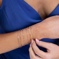 The Element Short Link Bracelet is a sleek and stylish accessory that adds a touch of sophistication to any outfit. With its elongated links and secure lobster clasp, this bracelet is perfect for layering or wearing on its own. Whether you're dressing up for a night out or keeping it casual, this versatile piece will be your go-to for a touch of elegance. The Element Short Link Bracelet is a 1.95 mm 14k solid gold elongated link chain with a lobster clasp closure. Wear it alone, or mix and match Rose Gold Oval Link Paperclip Bracelet For Everyday, Elegant Paperclip Bracelet With Rectangular Links For Formal Occasions, Minimalist Everyday Luxury Bracelet With Cable Chain, Everyday Rose Gold Oval Link Paperclip Bracelet, Everyday Rose Gold Paperclip Bracelet With Oval Links, Classic Rose Gold Paperclip Bracelet With Rectangular Links, Modern Formal Jubilee Paperclip Bracelet, Elegant Gold Bracelet With Cable Chain And Rectangular Links, Elegant 14k Gold Paperclip Bracelet With Delicate Chain