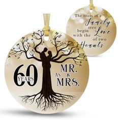 an ornament with a tree and the number 60 on it