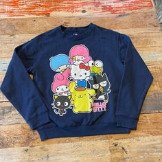 New! Navy Blue. Size Medium Blue Cartoon Print Sweatshirt For Streetwear, Blue Cotton Sweatshirt With Character Print, Blue Casual Sweatshirt With Character Print, Casual Blue Sweatshirt With Character Print, Trendy Blue Sweatshirt With Cartoon Print, Blue Casual Sweatshirt With Cartoon Print, Blue Cotton Top With Cat Print, Blue Crew Neck T-shirt With Cat Design, Blue Casual T-shirt With Cat Print