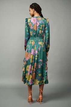 Combining a colorful floral print and feminine ruffle trim, this long-sleeve midi dress is a true stunner. It's breezy and flattering, designed with a split neckline, a clean placket, and a gathered bodice drawn in by smocking at the back waist. True to size •Split neckline •Long sleeves •Ruffle trim •Smocked back waist •Mid-length hem •Original 'Botanical Floral' print, designed by Current Air DIMENSIONS •Standard: 49.25" Length Item number 2290211100% Polyester Luxury Multicolor Casual Midi Dress, Luxury Summer Midi Dress With Vibrant Print, Luxury Multicolor Midi Dress For Fall, Mob Printed Long Dress, Floral Print Midi Dress Formal, Luxury Midi Dress With Vibrant Print For Summer, Luxury Floral Print Fall Midi Dress, Luxury Feminine Printed Dresses, Luxury Printed Midi Dress For Vacation