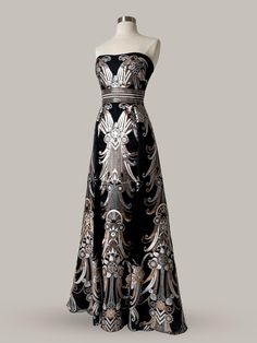 Dive into the world of haute couture with this Zuhair Murad Evening Maxi Dress, a true embodiment of luxury and sophistication. This size 4 gown comes in an elegant black color, featuring the designer's signature intricate details and romantic drama. The couture collection of Zuhair Murad is known for transporting its wearers to a glittering world of delicate details, and this dress is no exception. Originally retailing at $11775. With shipping options available to both the US and Canada, don't Evening Maxi Dress, Silver Gown, Romantic Drama, Zuhair Murad, Maxi Dress Evening, Couture Gowns, Delicate Details, Couture Collection, Dress Clothes For Women