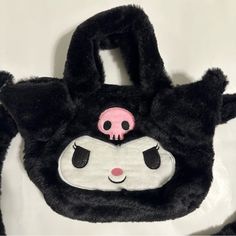 Brand New Black Fuzzy Bag, Adorable Kuromi Design Black Removable Strap Zip Closure Size Is Approximate: Length - 8 Inches Width - 3 Inches Height 5 Inches Strap - 46 Wear As A Crossbody Or Use As A Handbag Questions? Leave A Comment Below! #Kuromi #Hellokitty #Mymelody Cute Black Shoulder Bag With Detachable Strap, Black Kawaii Shoulder Bag With Adjustable Strap, Cute Black Bag With Removable Pouch, Cute Black Shoulder Bag With Removable Pouch, Black Kawaii Shoulder Bag For Daily Use, Kawaii Black Shoulder Bag, Black Kawaii Tote Bag, Cute Black Bag With Adjustable Strap, Cute Black Shoulder Bag With Adjustable Strap