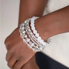 Infused With Silver Accents, A Glassy Collection Of White And Metallic Crystal-Like Beads Are Threaded Along Stretchy Bands Around The Wrist For A Whimsically Layered Look. Sold As One Set Of Six Bracelets. Bag 2 Bin B White Crystal Bracelet For Party, White Crystal Beaded Bracelets With Faceted Beads, White Faceted Beaded Bracelets For Wedding, White Beaded Crystal Bracelet For Party, White Wedding Bracelet With Faceted Beads, White Round Beads Crystal Bracelet For Party, White Crystal Bracelet With Round Beads For Party, White Crystal Bracelet With Faceted Beads For Party, White Crystal Beaded Bracelets For Party