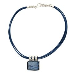 This handmade necklace is made of sterling silver and Murano glass. The rectangular pendant hangs from the cord through three silver rings. The glass bead is manually set in a expressly made silver frame. It is made with a process similiar to the "sommerso" technique, that consists on a layer of colored glass with the inclusion of a platinum leaf, coated with a crystal layer.This necklace gives a casual and youthful appearance. The price is intended for the necklace as pendant + cord. The glass has been handcrafted in Venice, then mounted and finished in Florence. See all the Sommerso Collection Nickel-free Adjustable Rectangular Pendant Jewelry, Nickel-free Adjustable Necklace With Rectangular Pendant, Nickel Free Adjustable Necklace With Rectangular Pendant, Modern Silver Necklace With Rectangular Stone, Modern Silver Glass Necklaces, Modern Adjustable Rectangular Necklace, Modern Rectangular Glass Jewelry, Adjustable Rectangular Sterling Silver Necklace, Adjustable Sterling Silver Rectangular Necklace