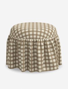 a brown and white checkered ottoman cover