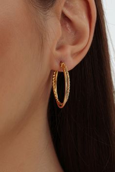 Indulge in the timeless allure of our 14K Real Gold Earrings, designed exclusively for women who appreciate the elegance of genuine gold. Crafted with precision, these Gold Hoop Earrings in 14k solid gold are the epitome of sophistication. Whether you're seeking a classic addition to your collection or a gift that exudes luxury, our solid gold hoops are the perfect choice. ★ ★ ★ These earrings are sold together. They will come in a pretty box and can be given as a present with a special message 14k Gold Hoop Earrings With Halo Design For Gift, Elegant Gold Plated Hoop Earrings With Shiny Finish, Gold Hoop Earrings With Halo Design In 14k Gold, Gold Hoop Earrings With Halo Design, Yellow Gold Hoop Earrings With Halo Design For Gift, Elegant Gold Huggie Earrings With Halo Design, Gold 14k Hoop Earrings With Halo Design, Elegant 14k Gold Hoop Earrings With Halo Design, Fine Jewelry Gold Hoop Earrings With Halo Design