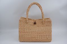 This is a high quality woven bag with Pu leather to use in a variety of ways, this can be a beach bag , summer bag  Detail++ Material: water hyacinth Closure: cream lining Approx size : Wide 5.5 inches Length 11.5 inches Height 8.5 inches SHIPPING: We Ship from Thailand and will be SHIPPED via THAI AIRMAIL and had TRACKING No. and Delivery Time 1-2 weeks to reach you Thank You ♥ NORNOR Everyday Rectangular Braided Straw Bag, Everyday Braided Rectangular Straw Bag, Everyday Rectangular Braided Beach Bag, Rectangular Crochet Bag With Woven Leather In Natural Color, Natural Crochet Bag With Woven Leather, Natural Woven Leather Rectangular Crochet Bag, Natural Rectangular Crochet Bag With Woven Leather, Rectangular Braided Beach Bag For Daily Use, Rectangular Braided Bag From Natural Fiber