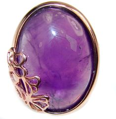 Handmade Unique 925 Sterling Silver ring with unique one of a kind Amethyst,  9.70 grams of marvelous handcrafted jewelry design. Only one piece availble ready to ship! It's unique worldwide ring - simply piece of art in world of fine jewelry. Purple Beauty  authentic Amethyst 18k Gold over .925 Sterling Silver Ring size 6 1/2  RING DETAILS: Weight: 9.70g; Size: 6 1/2; Material: Sterling Silver; Main stone: Amethyst; Other stones: Swiss Blue Topaz; Dimension: L - 3/4, W - 3/4, T - 3/8 inch; Stam Unique Amethyst Ring As A Gift, Unique Purple Amethyst Ring Gift, Unique Hallmarked Amethyst Ring For Gift, Luxury Handmade Amethyst Gift Ring, Handmade Purple Amethyst Ring Collectible, Elegant Amethyst Cabochon Ring In Sterling Silver, Spiritual Large Stone Purple Amethyst Ring, Sterling Silver Amethyst Oval Cabochon Ring Gift, Oval Amethyst Ring In Sterling Silver, Spiritual Style