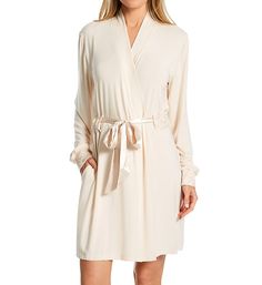 Long-sleeved robe is pleasantly soft for restful sleep and lounge. The floral lace details at cuffs and belt casing add an elegant touch. Made of knit micro modal, nylon, and elastane. Robe has a standing back neckline. Long sleeves help keep you warm. Removable satin belt secures at front. Sleeve cuffs and belt casing have floral lace overlay with rose gold metallic embroidery. On-seam pockets hold a phone. Satin internal ties also secure the front. Turned and stitched hem. Micro modal knit is Elegant V-neck Sleepwear For Lounging, Feminine V-neck Robe For Sleep, Elegant V-neck Sleepwear For Relaxation, Beige Long Sleeve Sleepwear, V-neck Lace Trim Robe For Daywear, Cozy Long Sleeve Cream Sleepwear, White Long Sleeve Relaxed Fit Nightgown, White Long Sleeve Sleepwear For Fall, Elegant Beige V-neck Sleepwear