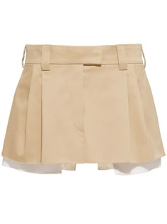 embroidered-logo chino miniskirt from MIU MIU featuring beige, cotton, pleat detailing, embroidered logo to the rear, low-rise, button fly fastening, belt loops, two rear welt pockets and layered details. | Miu Miu Embroidered-Logo Chino Miniskirt Miu Miu Mini Skirt, Skirt Png, Beige Skirt, Dr Wardrobe, Exclusive Fashion, Skirt Design, Pleated Mini Skirt, Van Cleef Arpels, David Yurman