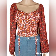 New With Tags, Orange, Floral, Flowy, Long Sleeve Blouse. Color Is Dark Orange With A White And Light Orange Floral Pattern. Brand Is Madden Nyc. Has Built In Bra Padding. Size:Large(11-13) Measurements- Pit To Pit:16in. Length:17in. Sleeve Length:25.5in. New With No Flaws Trendy Fitted Floral Print Blouse, Chic Fitted Floral Print Peasant Top, Fitted Casual Blouse With Floral Print, Trendy Non-stretch Floral Print Blouse, Fitted Printed Summer Blouse, Fitted Blouse For Fall Vacation, Fitted Floral Print Blouse For Day Out, Fitted Floral Print Blouse For Vacation, Fitted Floral Print Peasant Top For Spring