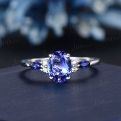 HOW TO STYLE : This tanzanite ring packaged in delicated gift box ,It is the most versatile and elegant statement ring for casual days in the office and nights out. It's your go-to statement piece whatever the occasion. It also can be personalized to show your uniqueness in the party, date, banquet. AFTER-SALE SERVICE : 30 days money-back guarantee and for any reason, you are not satisfied with your purchase, please contact me and I will quickly handle your request within 24 hours. DETAILS: - Ma Elegant Tanzanite Promise Ring, Elegant Oval Sapphire Gift Ring, Oval Tanzanite Wedding Ring, December Birthstone Jewelry, Tanzanite Engagement Ring, Etsy Wedding Rings, Tanzanite Ring, Natural Tanzanite, December Birthstone