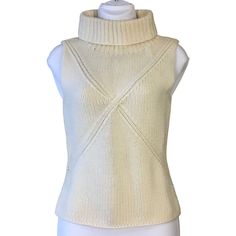 Trina Turk Los Angeles Sleeveless Turtleneck Patterned Knit Wool Sweater Medium Sleeveless Cable Knit Top For Layering, Chic Cream Knit Sweater Vest, Fitted Sleeveless Cable Knit Vest, Cream Knit Sweater Vest For Layering, Fitted Cable Knit Sleeveless Vest, Fitted Knit Sweater Vest For Winter, Fitted Cream Knit Tank Top, Chic Sleeveless Cable Knit Top, White Sleeveless Knit Top For Winter