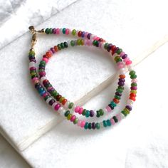 Beaded Necklaces for Women, perfect to layer and a fun piece of dainty jewelry to add a little splash of color!  D E T A I L S *4mm multi-color quartz  *Mixed in a random pattern, every necklace is different!  *14kt Gold-Filled clasp LENGTH *16 inches in length or 16 inches with a 2 inch extender  *Choose a 18 inch length or a 18 inch with a 2 inch extender for up to 20 inches. HOW TO PERSONALIZE *Select your choices from the drop down menu to create your custom design. ∙ EXTRA LOVE ∙ Handcrafte Multicolor Beaded Necklace With Gemstone Beads For Layering, Multicolor Round Beads Necklaces For Layering, Multicolor Gemstone Beaded Necklaces For Layering, Trendy Colorful Necklace With Tiny Beads, Everyday Multicolor Jewelry With Tiny Beads, Dainty Multicolor Necklace For Jewelry Making, Everyday Multicolor Beaded Jewelry, Trendy Faceted Beads Necklaces As Gift, Trendy Faceted Beads Necklace As Gift