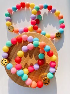 Rainbow smiley face bead bracelet ✨ Add a happy face bracelet to any outfit to give it a pop of color! These bracelets are a vibrant piece that are perfect for spring time! They make as adorable matching bracelets for you and someone special 💗 (You will receive only one bracelet, add two quantities for a matching set! 😁) Check out my other colorful styled bracelets to create your own adorable stack. - https://www.etsy.com/listing/1189462287/mushroom-bead-bracelet-colorful-bracelet?click_key=b7 Pastel Beads, Y2k Jewelry, Rainbow Jewelry, Festival Jewelry, Chunky Beads, Smiley Face, Matching Bracelets, Colorful Bracelets, Pastel Rainbow