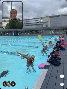 some people are in the water and one is holding up a yellow frisbee