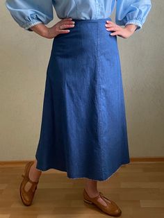 Adorable vintage Laura Ashley denim skirt. Great fit, great condition.  Size M.  **Great Vintage condition!  **This item will come to you freshly laundered and ready to wear. Vintage Long Denim Skirt For Spring, Vintage Long Denim Skirt For Summer, Vintage Fitted Denim Skirt With Frayed Hem, Fitted Vintage Denim Skirt With Frayed Hem, Stretch Cotton Skirt In Light Wash, Vintage Fitted Skirt In Medium Wash, Vintage Denim Skirt In Denim Blue, Vintage Denim Skirt With Frayed Hem, Vintage Fitted Medium Wash Skirt