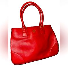 Elevate Your Style With This Stunning Tory Burch Handbag In A Vibrant Shade Of Red. Perfect For Any Occasion, This Top Handle Bag Features Double Handles And A Zip/Magnetic Closure For Easy Access To Your Belongings. The Exterior Is Made Of High-Quality Leather, While The Interior Is Lined With Soft Fabric In A Neutral Beige Color. With Its Gold Hardware Accents And Iconic Tory Robinson Model, This Bag Is A Must-Have For Any Fashion-Forward Woman. It's The Perfect Size For Everyday Use And Can Hold All Your Essentials Without Being Too Bulky. Add A Pop Of Color To Your Wardrobe With This Gorgeous Handbag Today! This Bag Is In Pristine Condition! Red Top Handle Business Bag, Red Top Handle Bag For Business, Classic Red Shoulder Bag With Top Carry Handle, Classic Red Shoulder Bag With Top Handle, Classic Red Shoulder Bag For Travel, Classic Red Bag With Top Carry Handle, Red Double Handle Satchel For Business, Red Office Bags With Top Carry Handle, Red Office Bag With Top Carry Handle