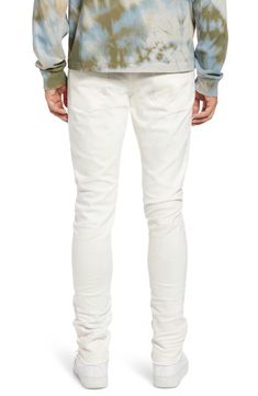 Crisp white Japanese-denim jeans are cut in a skinny fit with a hint of stretch that allows you to move freely and comfortably in these five-pocket jeans. 32 1/2" inseam; 13" leg opening; 10 1/2" front rise; 14" back rise (size 32) Zip fly with button closure Five-pocket style 98% cotton, 2% polyurethane Machine wash, line dry Made in Japan Men's Clothing White Stretch Denim Jeans, Slim Fit White Denim Bottoms, White Slim Fit Denim Bottoms, White Five-pocket Jeans For Everyday, White Stretch Bottoms With Five Pockets, Classic White Stretch Jeans, Casual Fitted White Jeans, White Jeans For Fall Streetwear, White Everyday Jeans With Five Pockets