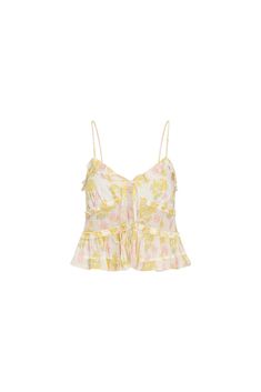 Loving on the Lavetta Top. This must-have cotton voile cami top features a dreamy mixed print featuring sunshine yellow and pretty pink florals all over. The flirty top has spaghetti straps, delicate ruffle details at the waist, trim details at the busts and tiny ruffles at the neckline. This piece is finished with a sweet, dainty tie detail at center front. Love Shack Fancy Top, Beachy Top, Girly Tops, Spain Trip, Flirty Tops, Fancy Tops, Europe Trip, Sunshine Yellow, Yellow Top