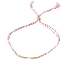 Cord bracelets are modern, casual, fun, and versatile! Wear one by itself, or layer them with other cord or chain bracelets for a trendy look. Pink and gold is the theme for this bracelet - a gold tube bead and a gold slider bead contrasts well with the dark pink double stranded silk cord. The bracelet is adjustable by sliding the cord to the perfect length. A great everyday bracelet! MATERIALSilk cordGold filled curved tube beadGold filled silicone slider beadSIZEAdjustable corded bracelet - one size fits mostWHAT IS GOLD FILLED?We used to have just 2 choices: pure gold or gold plated. The first was very expensive, and the second was…well…not very good.Our gold filled jewelry is designed to last you a lifetime without the price of solid gold pieces. Instead of a thin layer of gold that ca Casual Gold Bracelet With Adjustable Cord, Casual Gold Braided Bracelet With Adjustable Cord, Gold Casual Braided Bracelets With Adjustable Length, Trendy Gold Beaded Bracelet With Adjustable Length, Casual Gold Braided Bracelet With Adjustable Length, Casual Gold Resizable Braided Bracelets, Trendy Gold Friendship Bracelets For Everyday, Casual Gold Braided Bracelets For Everyday, Trendy Gold Braided Bracelet With Adjustable Length