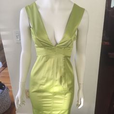 You Need This Dress! Brand New Roberto Cavalli Fitted, Midi Dress. From His "Just Cavalli" Collection. Vibrant Lime Green, Stretch Satin. Beautiful Tailoring, Empire Waist, Low Cut Front And Back. Stunning Color Chartreuse! Pics Do No Justice Head Turner See Last 2 Pics For Color Brand New Dress With Tags. Sold Out In Stores. Price May Go Up In Summer! Waiting For Perfect Buyer! Stand Out In A Sea Of Lbds At Your Next Event Size 4/6 Back Zip Closure Below The Knee Back Split Yellow Silk Dress For Night Out, Yellow V-neck Midi Dress For Evening, Fitted Yellow Midi Dress For Formal Occasions, Elegant Yellow Mini Dress, Yellow Lined Fitted Midi Dress, Yellow Sleeveless Silk Midi Dress, Yellow Fitted Midi Dress With Lining, Yellow Fitted Silk Dress, Yellow Fitted Midi Dress, Lined