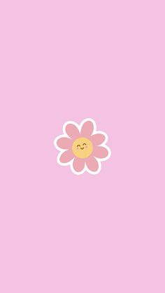 a pink flower with a smiley face on it