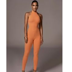 Orange Halter Jumpsuit. Halter Top Has Buttons, No Additional Closures. Material Is Very Stretchy, But Is Not “Snatched” Material. Elegant Fitted Orange Jumpsuits And Rompers, Orange Fitted Elegant Jumpsuit, Elegant Fitted Orange Jumpsuit, Orange Fitted Chic Jumpsuits And Rompers, Chic Orange Fitted Jumpsuits And Rompers, Fitted Sleeveless Orange Bodysuit, Trendy Fitted Orange Bodysuit, Trendy Orange Fitted Bodysuit, Fitted Orange Sleeveless Jumpsuits And Rompers