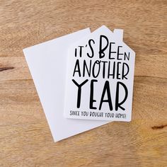 two cards that say it's been another year since you bought your home