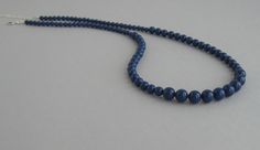 Lapis blue Swarovski pearls necklace is available in 16 inches (40.5cm), 18 inches (45.5cm) and 20 inches (51cm) long and it has an extension 2 inches (5cm) long. Please select the length for necklace. Materials and sizes: The Swarovski pearls are made in Austria. Pearls are 8mm, 6mm and 4mm Color: Lapis blue Sterling silver chain clasp and crimps The necklace will be shipped in a small gift box. If you need more quantity? Contact us. We'd be happy to make custom pieces for you as well! Thank yo Elegant Blue Necklace With 8mm Beads, Elegant Blue Necklaces With 8mm Beads, Blue Single Strand Pearl Necklace Gift, Blue Single Strand Pearl Necklace As Gift, Blue Single Strand Pearl Necklace For Gift, Formal Blue Single Strand Beaded Necklace, Classic Blue Pearl Necklace For Gift, Blue Single Strand Pearl Necklace For Formal Occasions, Formal Blue Single Strand Pearl Necklace