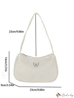 a white purse with a butterfly on the side and measurements for each item in front