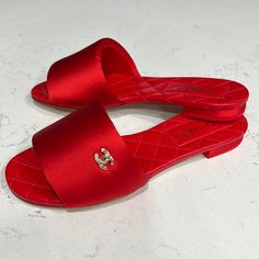 Bnib Chanel Sandals In Red. Elegant Flat Heel Sandals With Red Sole, Red Slip-on Sandals For Evening, Red Classic Sandals With Round Toe, Classic Red Round Toe Sandals, Classic Red Sandals With Round Toe, Classic Red Open Toe Sandals, Red Flat Heel Sandals For Evening, Elegant Red Slip-on Sandals, Classic Sandals With Red Sole