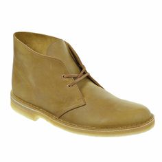 Store Home Shipping Payments Return Policy Customer Service Our Guarantee Clarks Desert Men's Boots Mustard 26108405 Model #: 26108405 Color: Mustard Material: Leather, Synthetic Our Price: 99.95  Size Chart  *Approximate sizing for this item Clarks Mens (US) 7 7.5 8 8.5 9 9.5 10 10.5 11 11.5 12 13 14 15 UK 6.5 7 7.5 8 8.5 9 9.5 10 10.5 11 11.5 12.5 13.5 14.5 EUR 40 41 41 42 43 43 44 45 45 46 47 48 49 50 JAPAN 25 25.5 26 26.5 27 27.5 28 28.5 29 29.5 30 31 32 33 Product Description An international cult classic, the iconic men's Desert Boot by Clarks Originals was inspired by crepe-soled boots worn by British officers in World War II. Crafted from natural materials including mustard leather for supreme comfort, its timeless styling has remained unchanged for over 60 years. Handsewn construc Casual Plain Toe Boots For Winter, Masculine Fall Chukka Boots With Round Toe, Masculine Fall Boots With Round Toe, Classic Winter Chukka Boots With Leather Sole, Classic Business Chukka Boots For Winter, Formal High-top Boots With Stitched Sole, Casual Leather Desert Boots For Winter, Classic Boots With Reinforced Heel And Plain Toe, Classic Brown Chukka Boots With Reinforced Heel