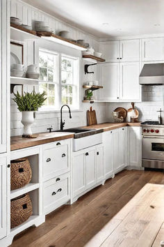 Charming farmhouse kitchen with white cabinetry, open shelving, butcher block countertops, and an apron-front sink for a classic rustic look. White Cabinets Wood Countertops Kitchen, Natural Wood And White Kitchen Modern, Interior Design Kitchen Cozy, Small Kitchen Wood Floor, White Wall Kitchen Ideas, White Shiplap Walls Kitchen, Light Wood Cabinets White Countertops, White Kitchen Cabinets Wood Countertops, White Kitchen Cabinets With Wood Accents